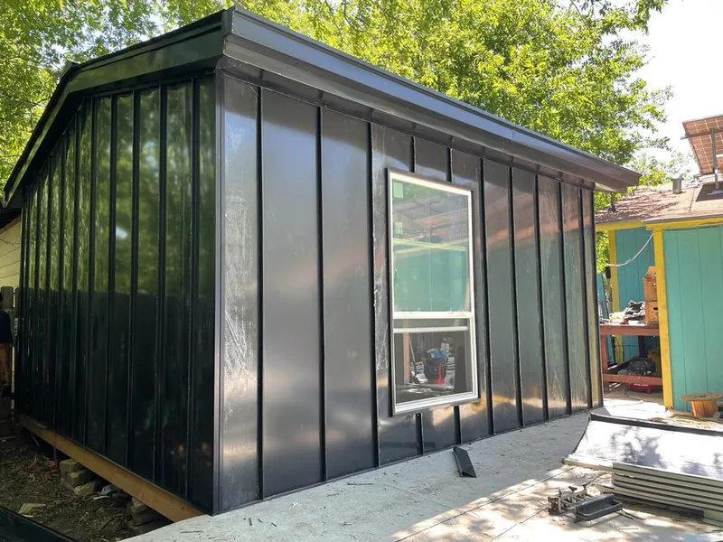 Black standing seam metal wall panels for Metal Roof Installation in Oil City