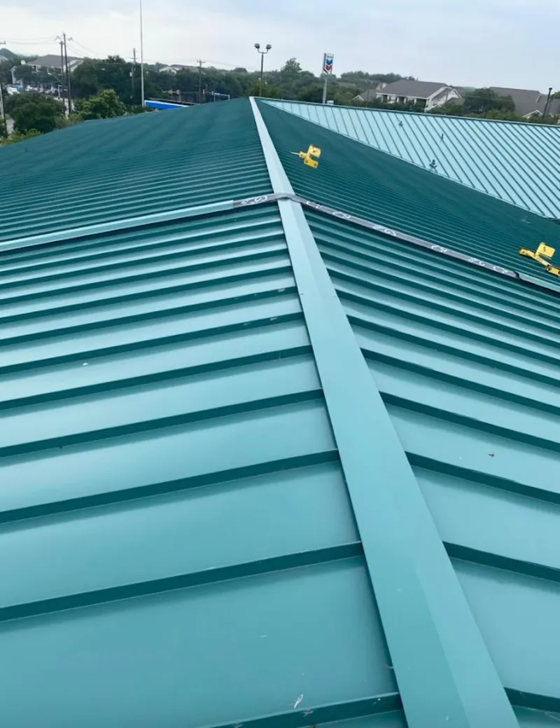 Green commercial metal roof ridge and valley for Metal Roof Repair in Oil City